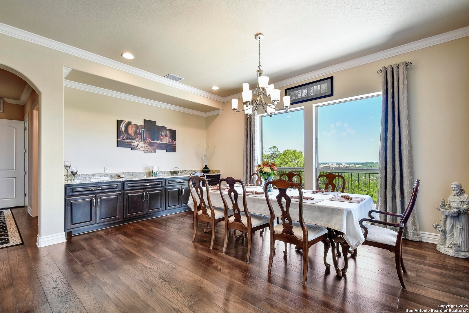 8 Braeburn Court Bulverde, TX 78163 - Photo 24 of 64 a view of a dining room with furniture window and wooden floor