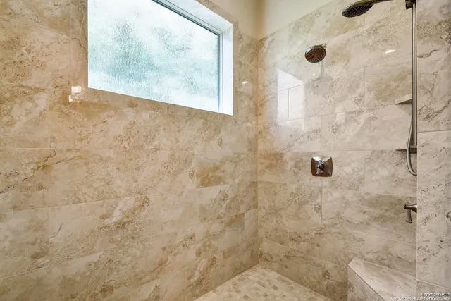 a view of a hallway with an entryway and workspace