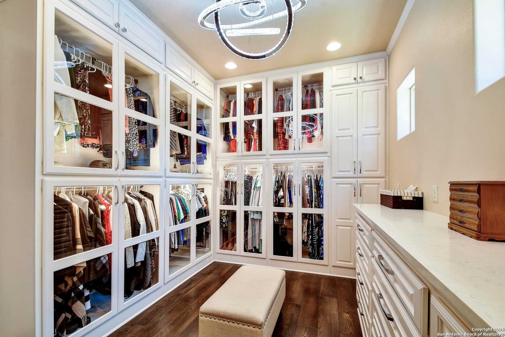 8 Braeburn Court Bulverde, TX 78163 - Photo 34 of 64 a view of a walk in closet with clothes and shoes