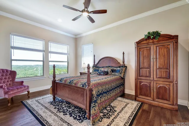 a view of an outdoor dining space with furniture and garden