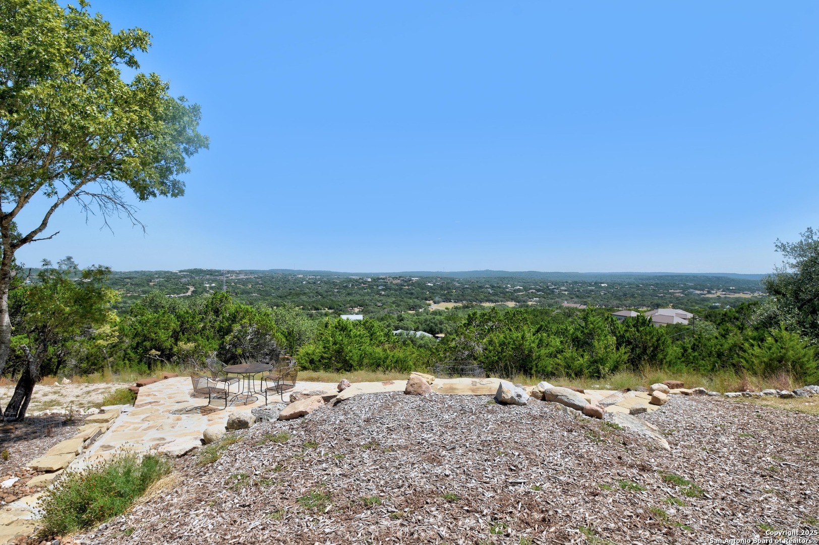 8 Braeburn Court Bulverde, TX 78163 - Photo 53 of 64 a view of a road with a yard