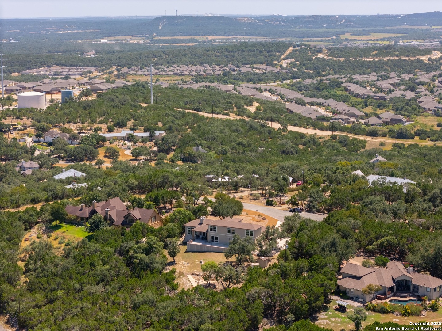 8 Braeburn Court Bulverde, TX 78163 - Photo 62 of 64 an aerial view of city and lake