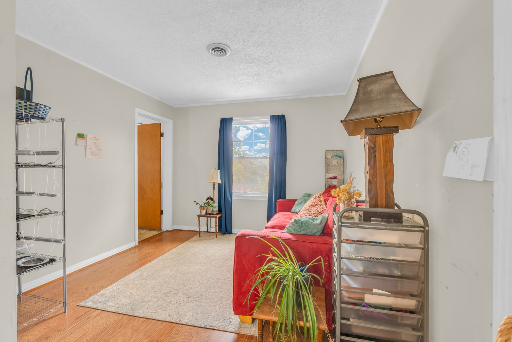 5881 Burgess Falls Road Sparta, TN 38583 - Photo 29 of 29 a living room with a bed furniture and a window