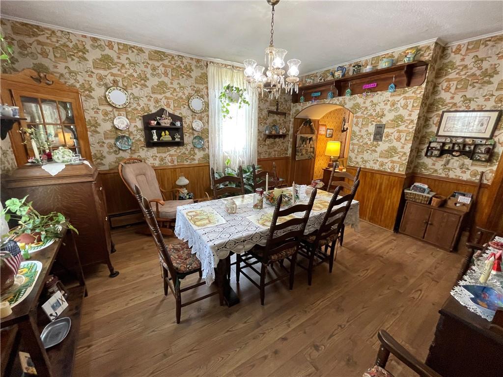 355 Old Plank Road Butler, PA 16002 - Photo 11 of 36 a view of a dining room with furniture and chandelier