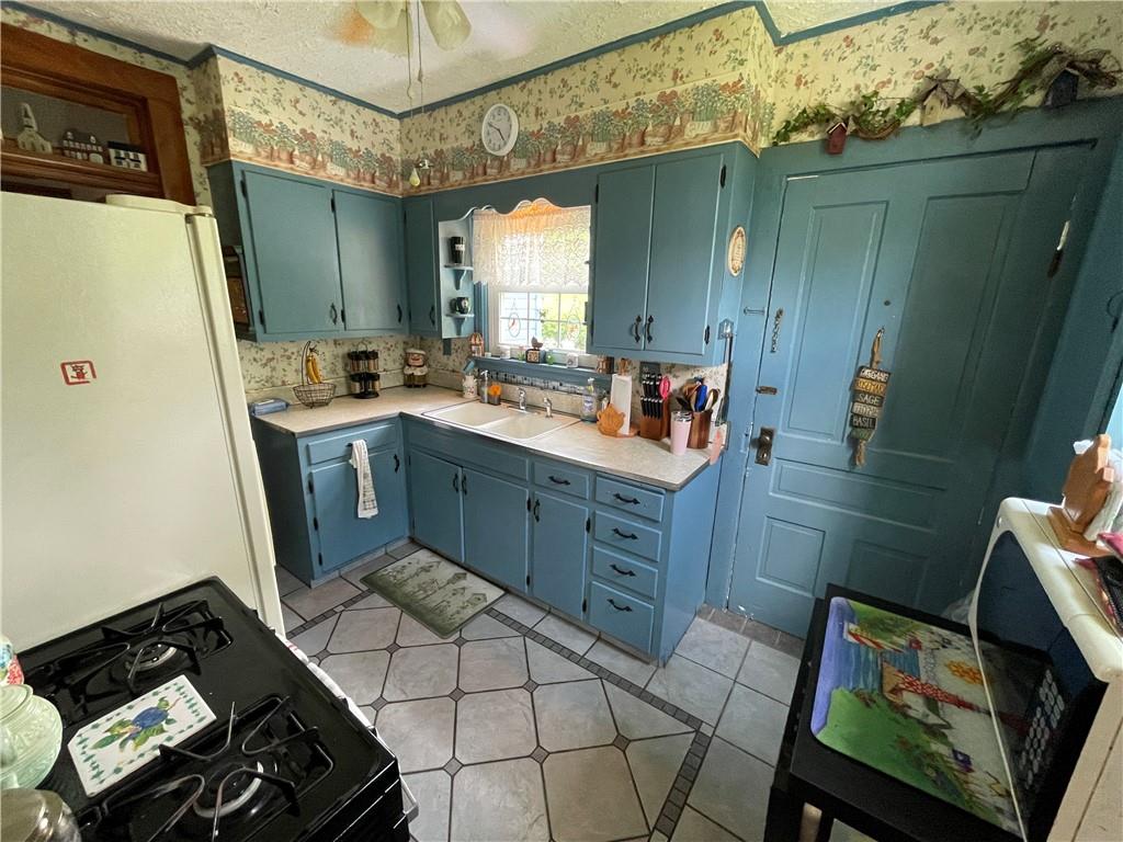 355 Old Plank Road Butler, PA 16002 - Photo 12 of 36 a kitchen with sink cabinets and appliances