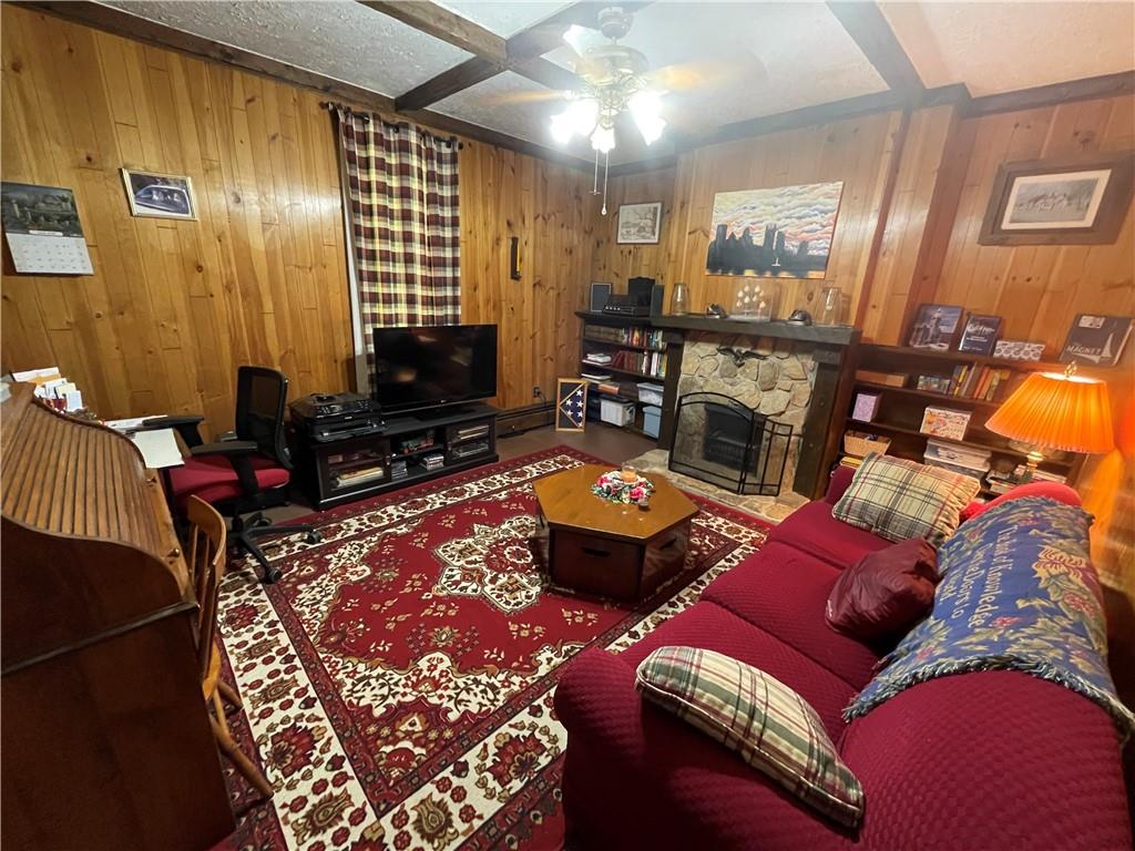 355 Old Plank Road Butler, PA 16002 - Photo 15 of 36 a living room with furniture and a flat screen tv