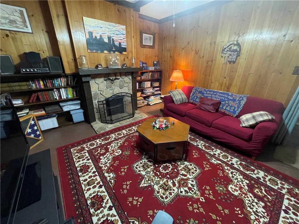 355 Old Plank Road Butler, PA 16002 - Photo 16 of 36 a living room with furniture and a fireplace