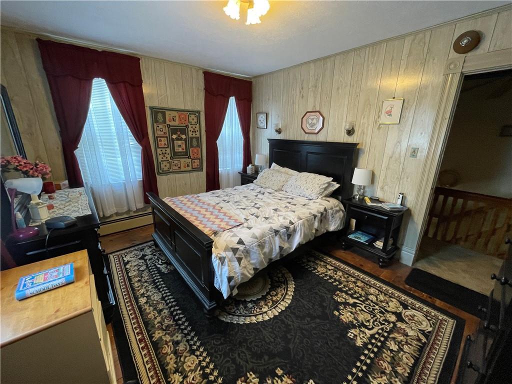 355 Old Plank Road Butler, PA 16002 - Photo 21 of 36 a bed sitting in a bedroom next to a window