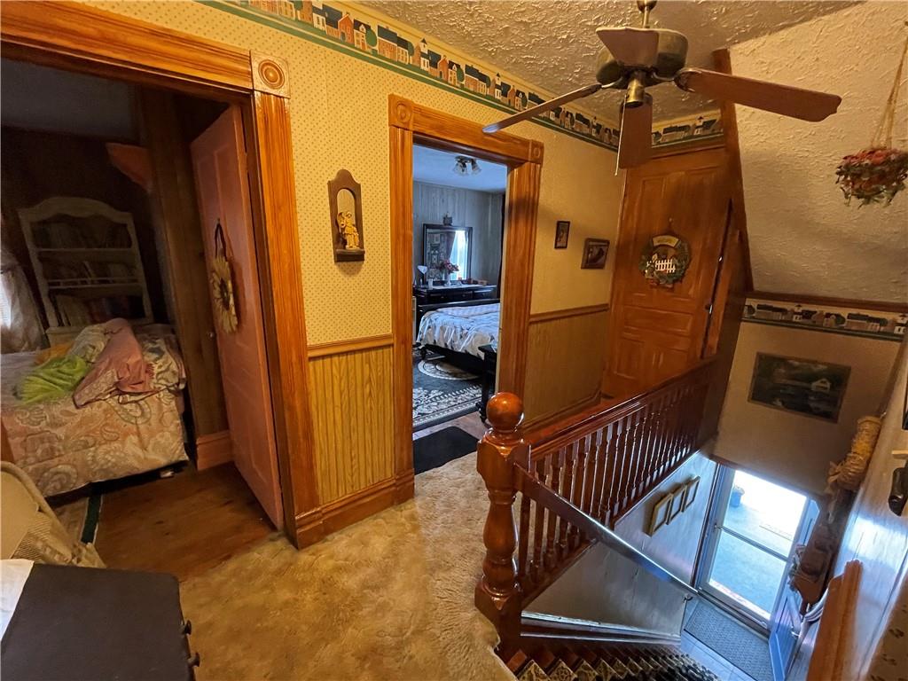 355 Old Plank Road Butler, PA 16002 - Photo 26 of 36 a view of staircase with a rug and a window