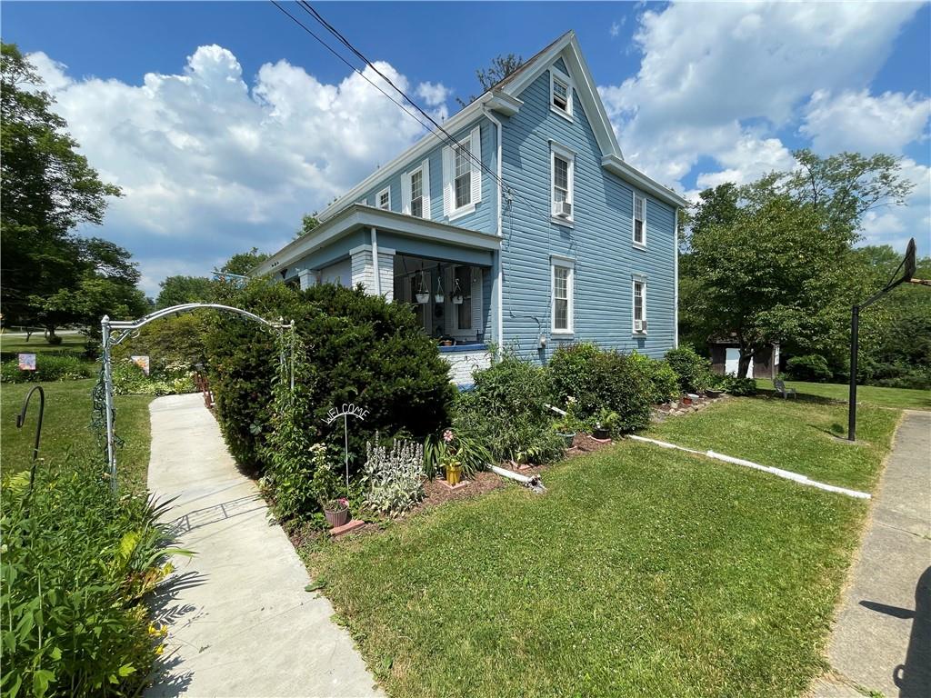 355 Old Plank Road Butler, PA 16002 - Photo 27 of 36 a front view of a house with a yard