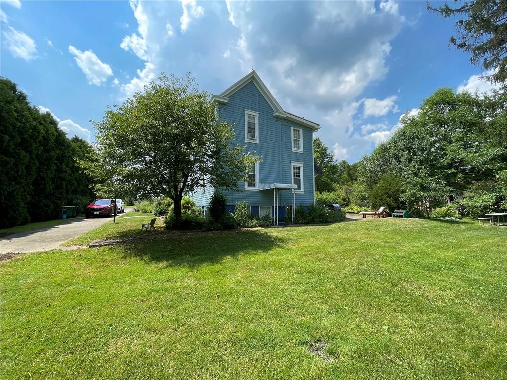 355 Old Plank Road Butler, PA 16002 - Photo 28 of 36 a front view of house with yard and trees