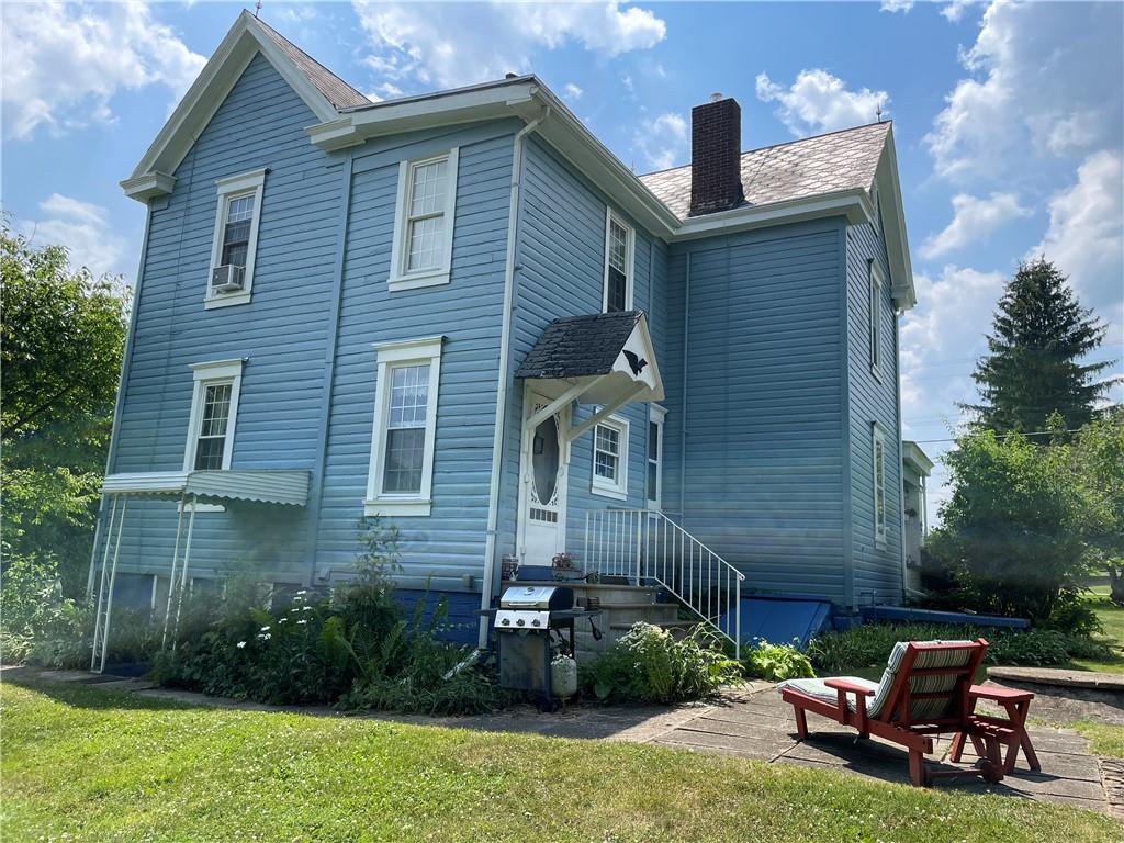 355 Old Plank Road Butler, PA 16002 - Photo 30 of 36 a front view of a house with garden