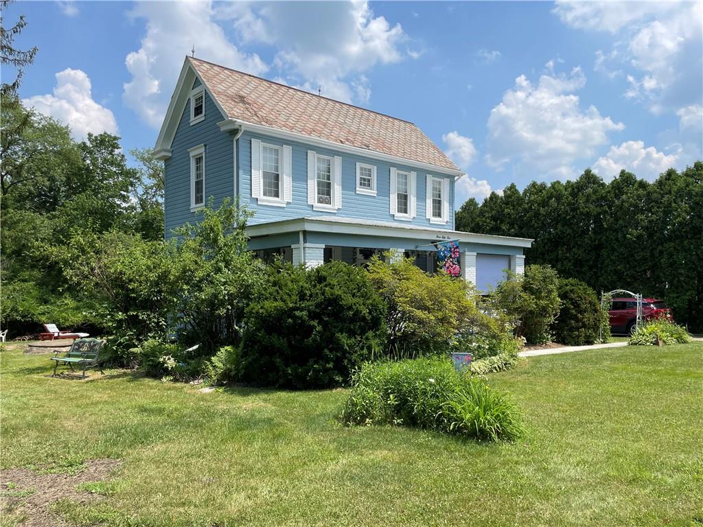 355 Old Plank Road Butler, PA 16002 - Photo 33 of 36 a view of a house with a backyard