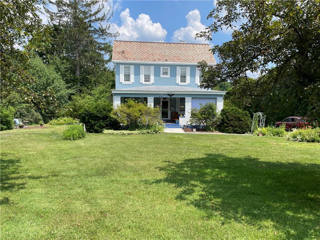 355 Old Plank Road Butler, PA 16002 - Photo 34 of 36 a front view of house with yard and green space
