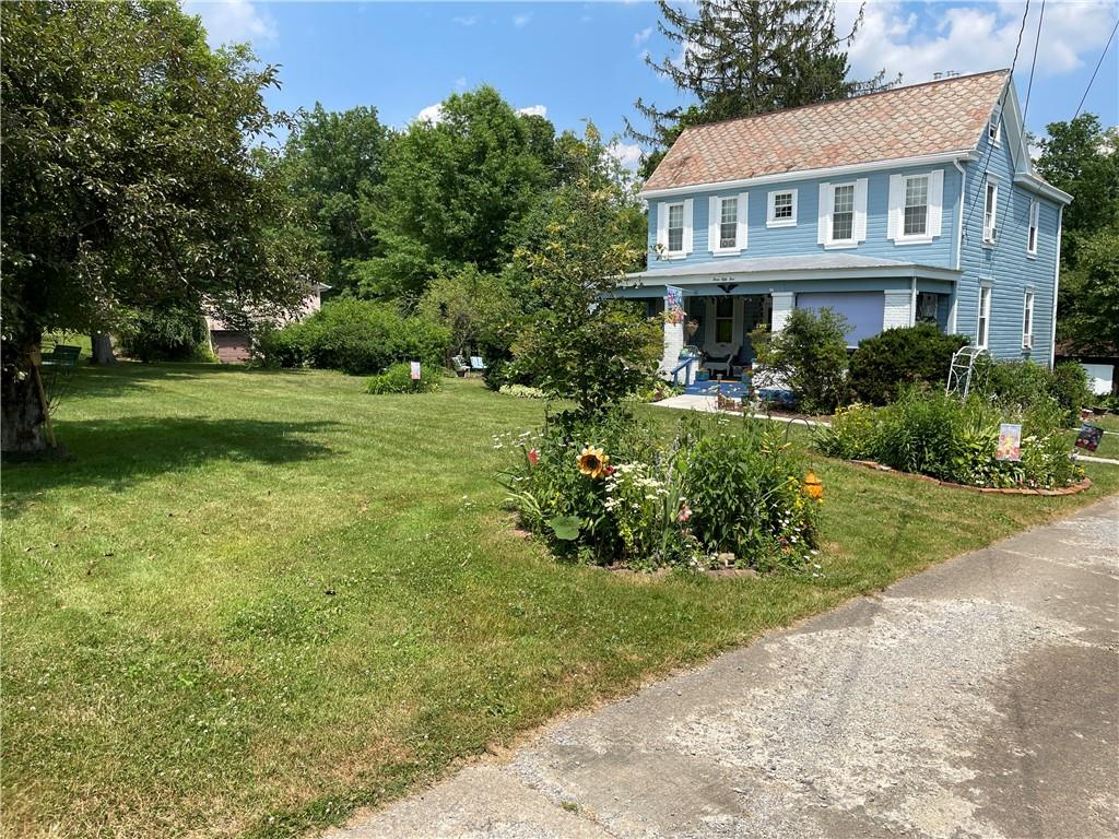 355 Old Plank Road Butler, PA 16002 - Photo 35 of 36 a front view of a house with a yard