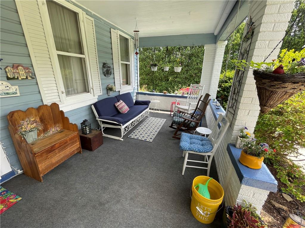 355 Old Plank Road Butler, PA 16002 - Photo 4 of 36 a living room with furniture and a potted plant