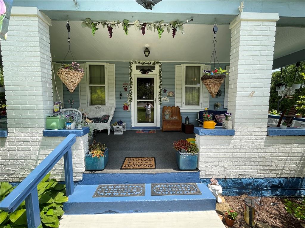 355 Old Plank Road Butler, PA 16002 - Photo 5 of 36 a front view of a house with outdoor seating