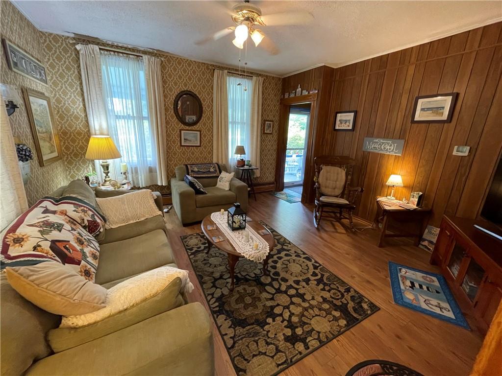 355 Old Plank Road Butler, PA 16002 - Photo 7 of 36 a living room with furniture and a fireplace