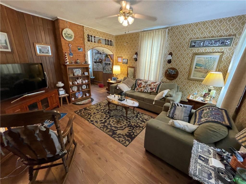 355 Old Plank Road Butler, PA 16002 - Photo 8 of 36 a living room with furniture and a flat screen tv