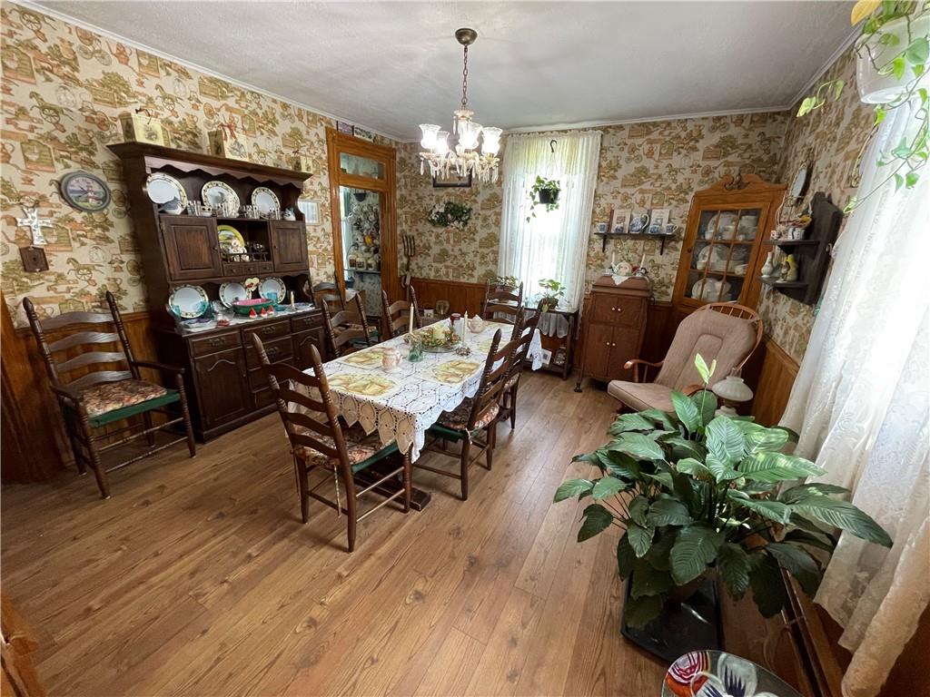 355 Old Plank Road Butler, PA 16002 - Photo 9 of 36 a view of a dining room with furniture window and wooden floor