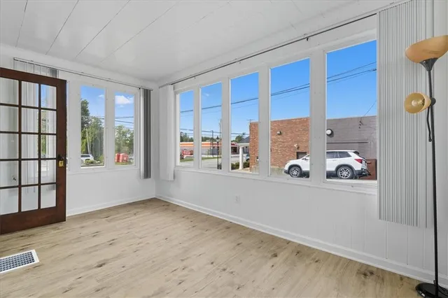 a view of kitchen with furniture and large window