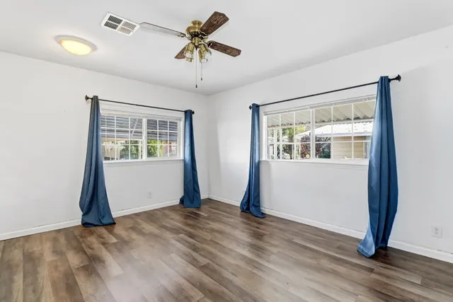 a view of a pathway of a wooden building