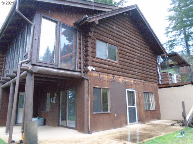 12125 Southeast Laughing Water Road Sandy, OR 97055 - Photo 3 of 24 a view of a house with backyard and porch