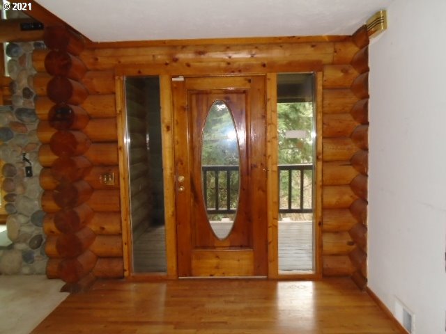 12125 Southeast Laughing Water Road Sandy, OR 97055 - Photo 5 of 24 a view of an entryway door