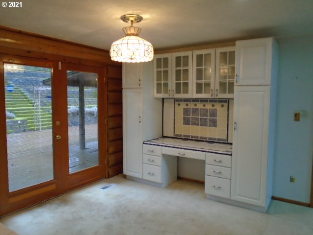 12125 Southeast Laughing Water Road Sandy, OR 97055 - Photo 8 of 24 wooden floor in an empty room with a window