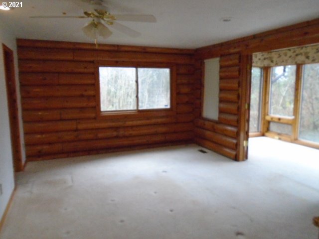 12125 Southeast Laughing Water Road Sandy, OR 97055 - Photo 9 of 24 a view of room with window and cabinet