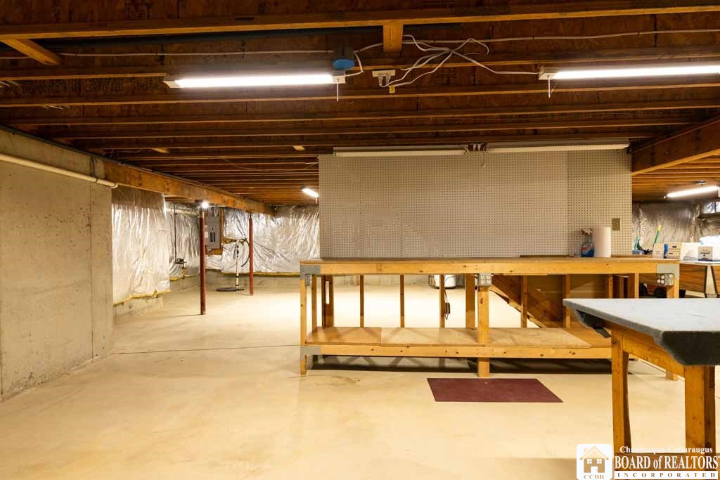 11 Pleasant Avenue Pomfret, NY 14063 - Photo 35 of 45 2nd view of work bench in basement