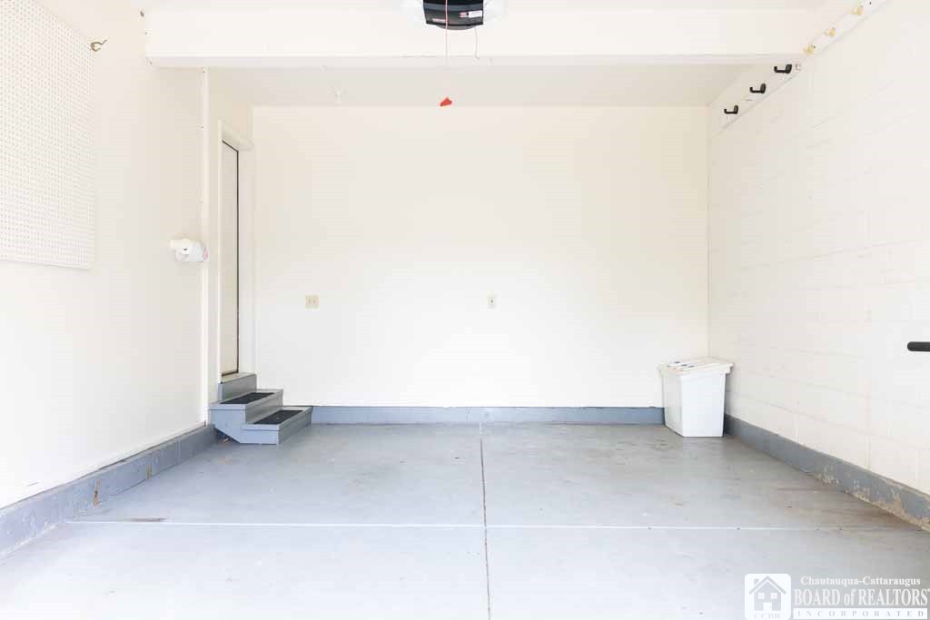 11 Pleasant Avenue Pomfret, NY 14063 - Photo 43 of 45 Single car attached garage with entry door to main