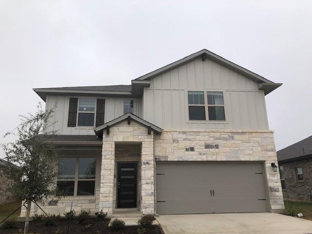 137 Peruvian Lane Georgetown, TX 78626 - Photo 1 of 12 a view of a house with large windows