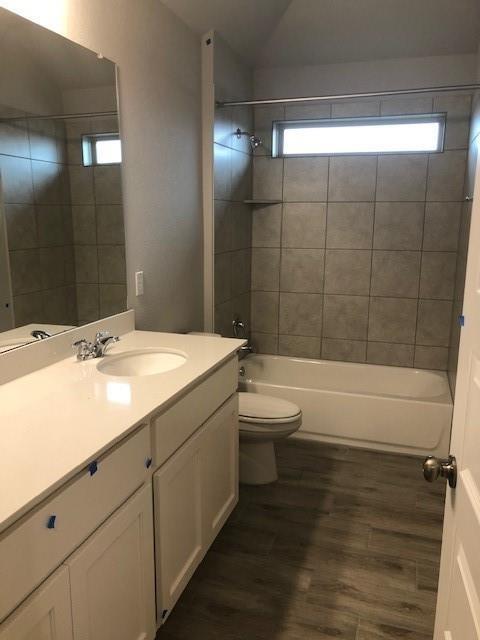 137 Peruvian Lane Georgetown, TX 78626 - Photo 5 of 12 a bathroom with a sink a toilet and shower