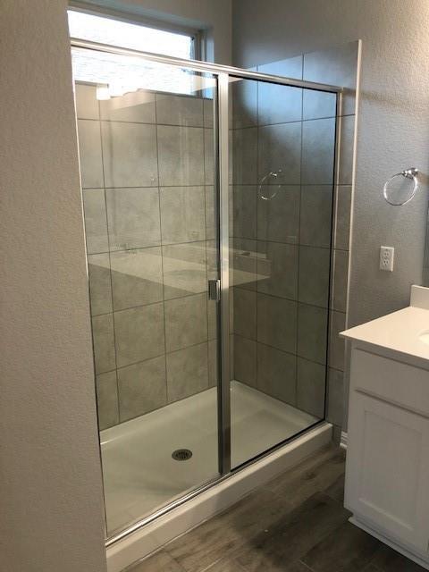 137 Peruvian Lane Georgetown, TX 78626 - Photo 9 of 12 a bathroom with a shower and a bathtub