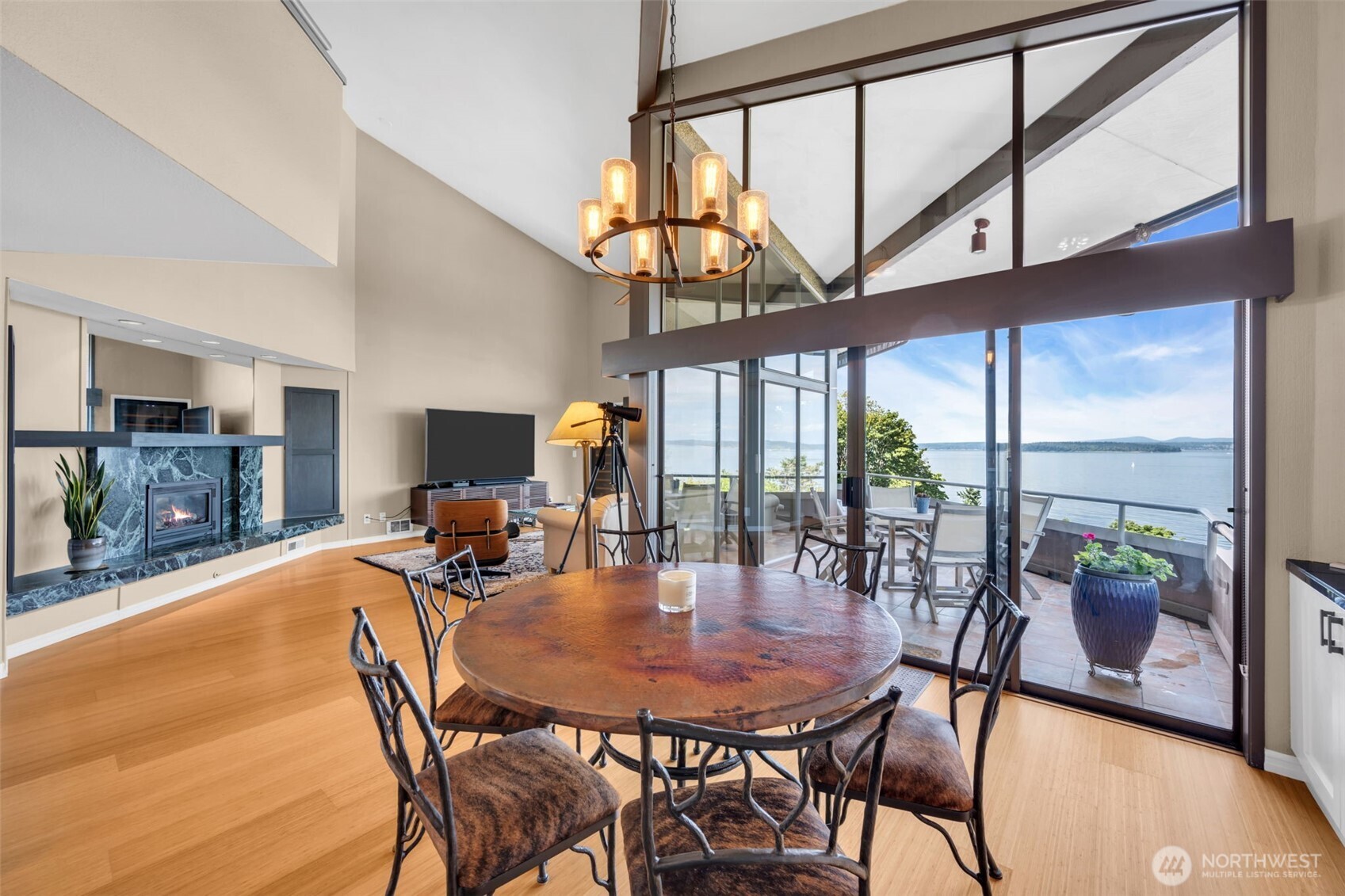 7019 47th Avenue Southwest, Unit 18 Seattle, WA 98136 - Photo 18 of 39 a view of a dining room with furniture window and wooden floor