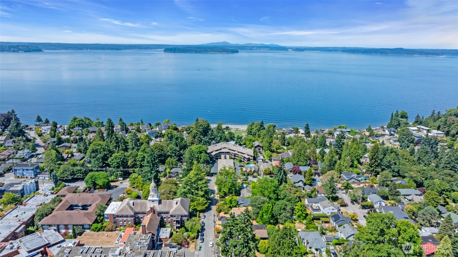 7019 47th Avenue Southwest, Unit 18 Seattle, WA 98136 - Photo 29 of 39 a view of a lake