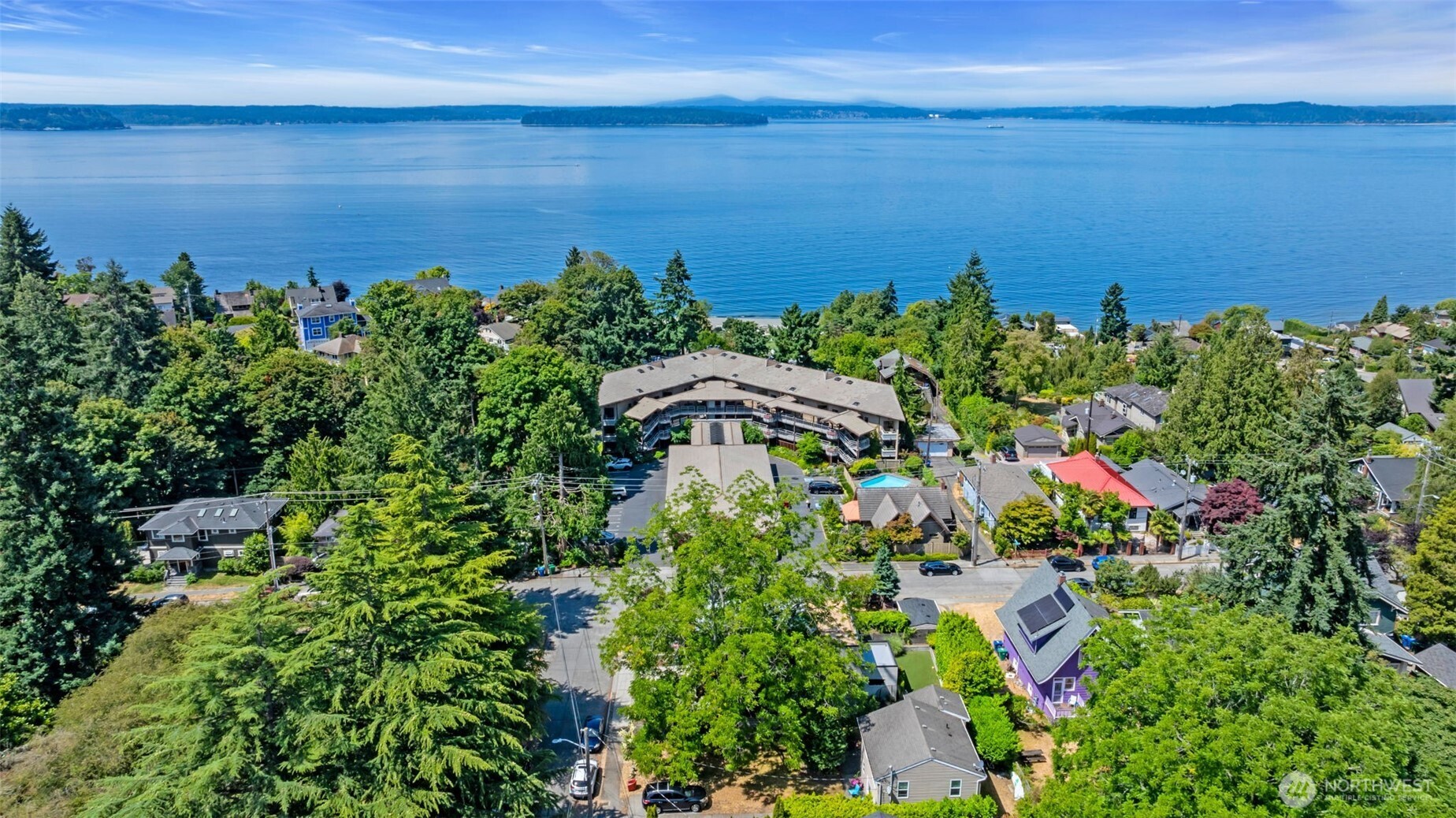 7019 47th Avenue Southwest, Unit 18 Seattle, WA 98136 - Photo 30 of 39 a view of a lake