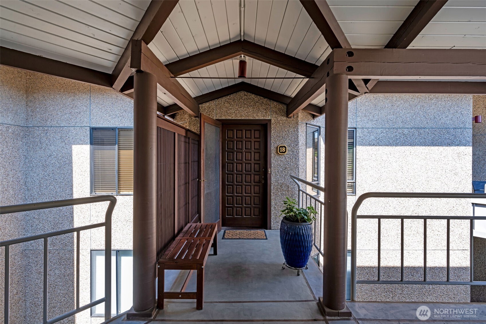 7019 47th Avenue Southwest, Unit 18 Seattle, WA 98136 - Photo 4 of 39 a view of an entryway of house