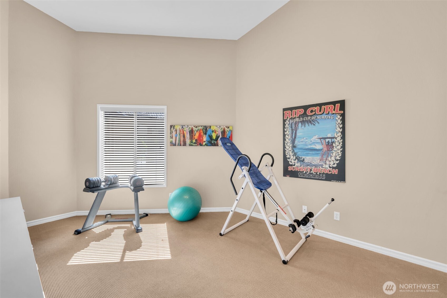7019 47th Avenue Southwest, Unit 18 Seattle, WA 98136 - Photo 6 of 39 a view of a room with gym equipment