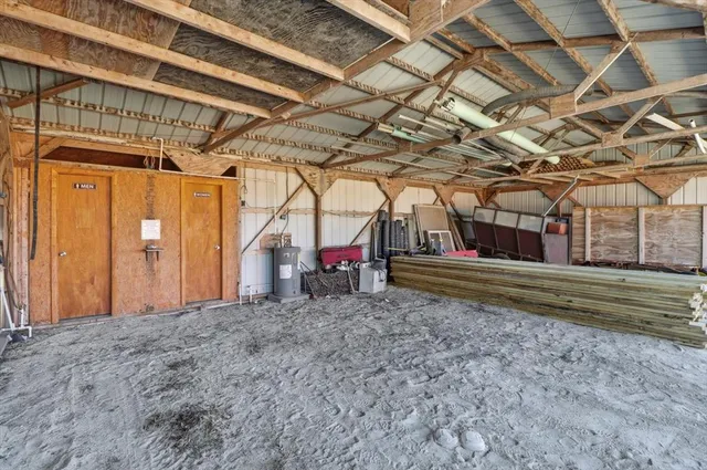 a view of a room with wooden walls