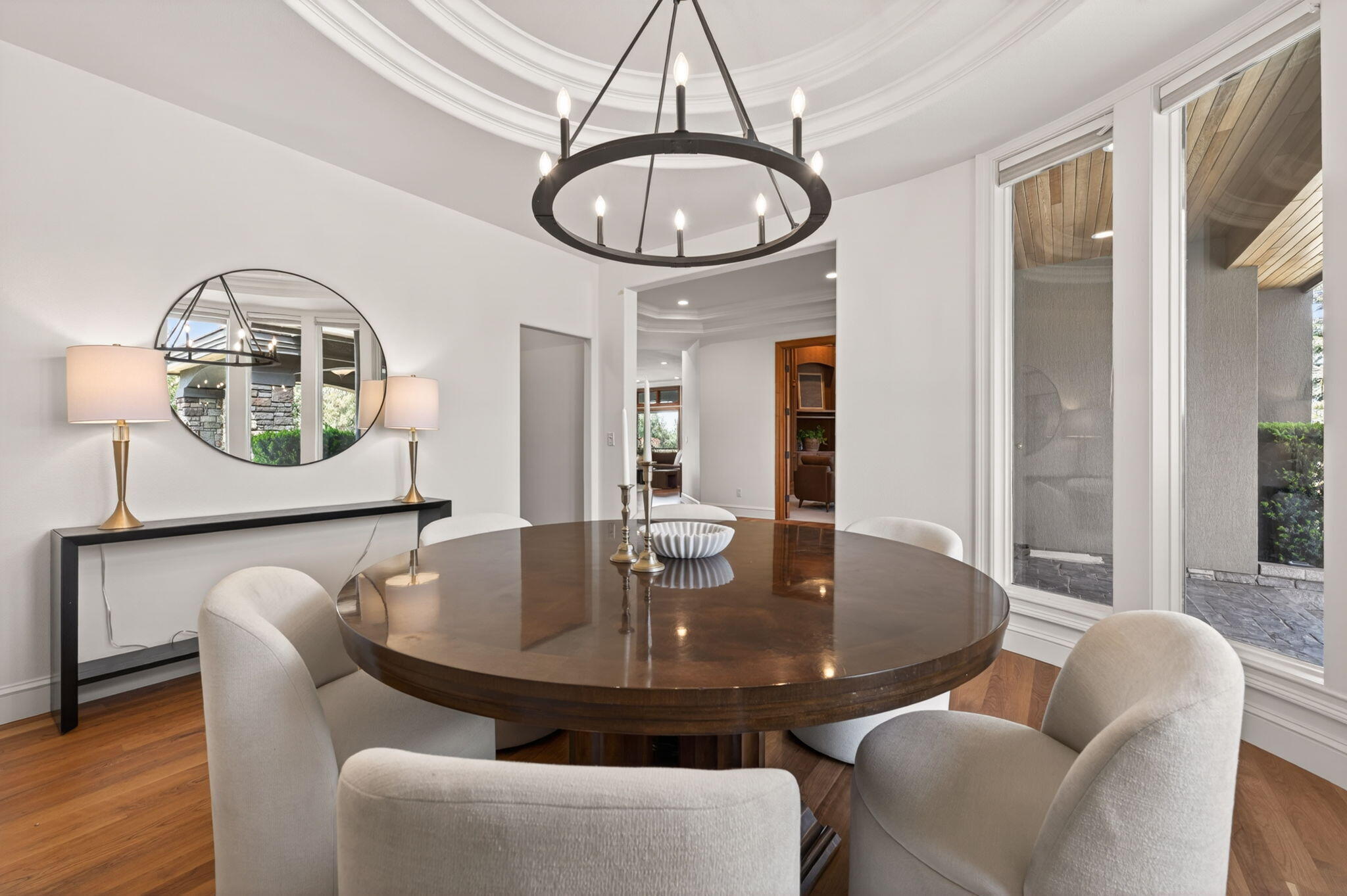 20180 Winston Loop Bend, OR 97703 - Photo 18 of 59 a view of a dining room with furniture window and wooden floor