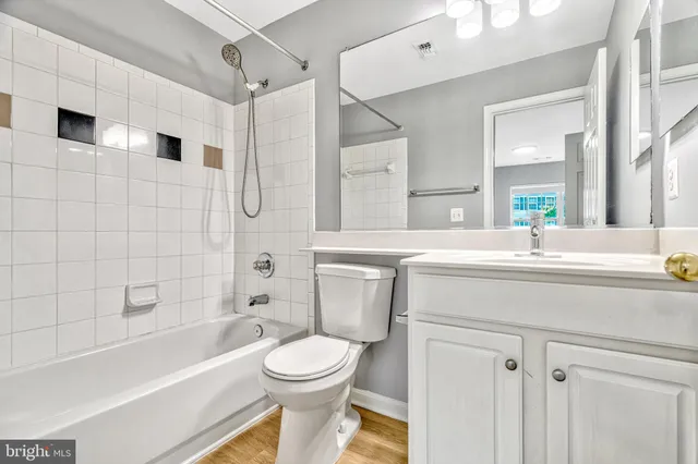 a bathroom with a sink a toilet and a bathtub