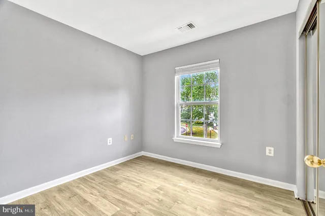 a view of a room with a window