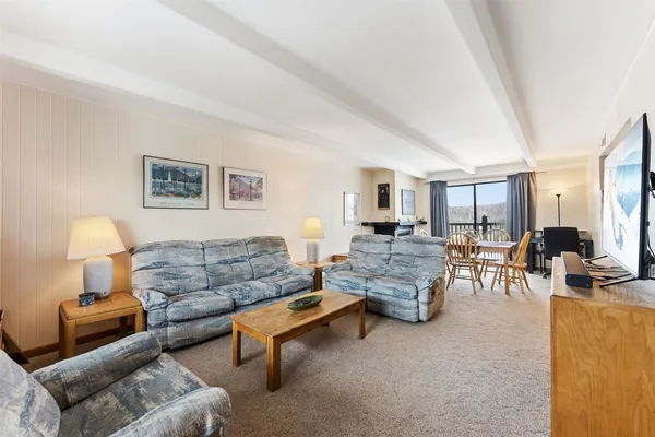 a living room with furniture and a couch