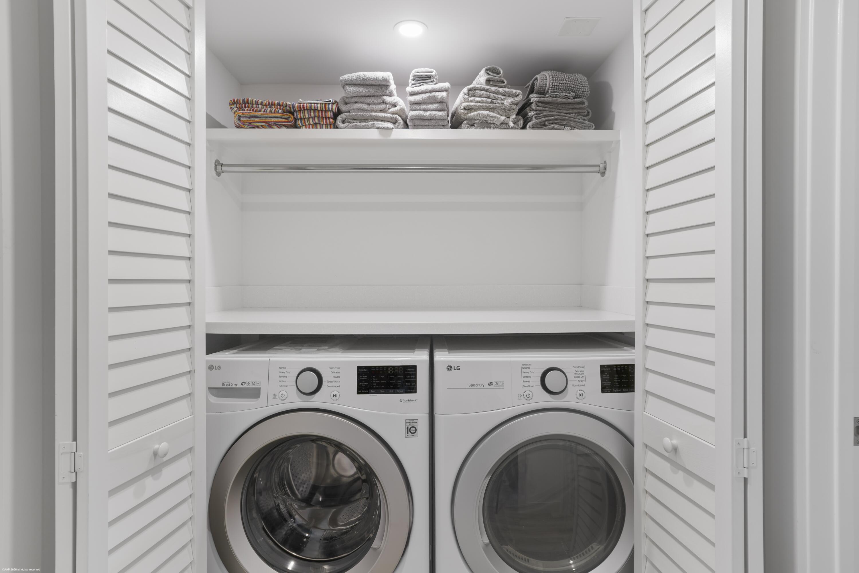 13334 Polo Club Road, Unit 234 Wellington, FL 33414 - Photo 17 of 41 a view of washer and dryer in a utility room