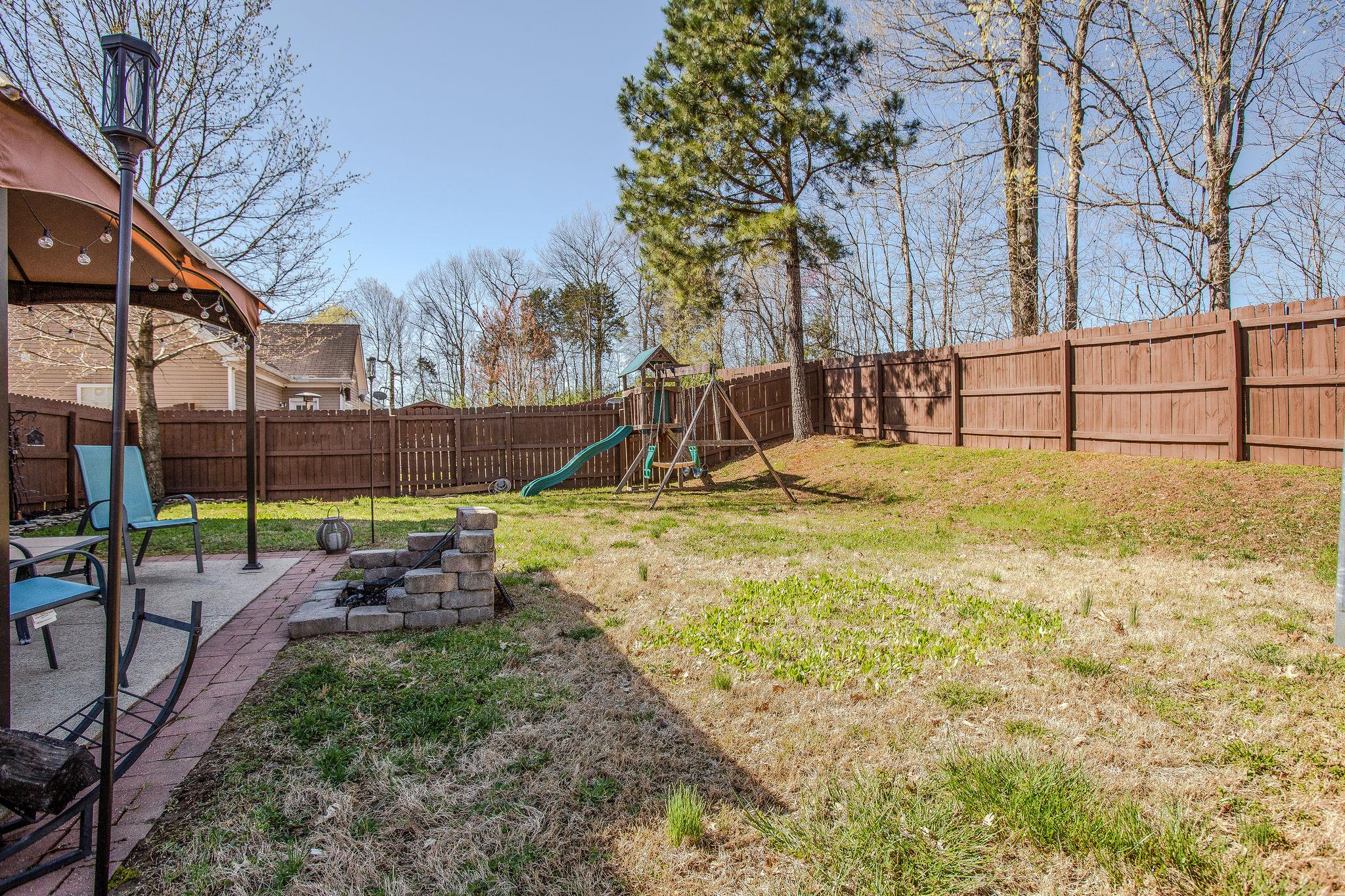 2016 Red Jacket Trace Spring Hill, TN 37174 - Photo 21 of 24 Privacy fence with tree line behind.