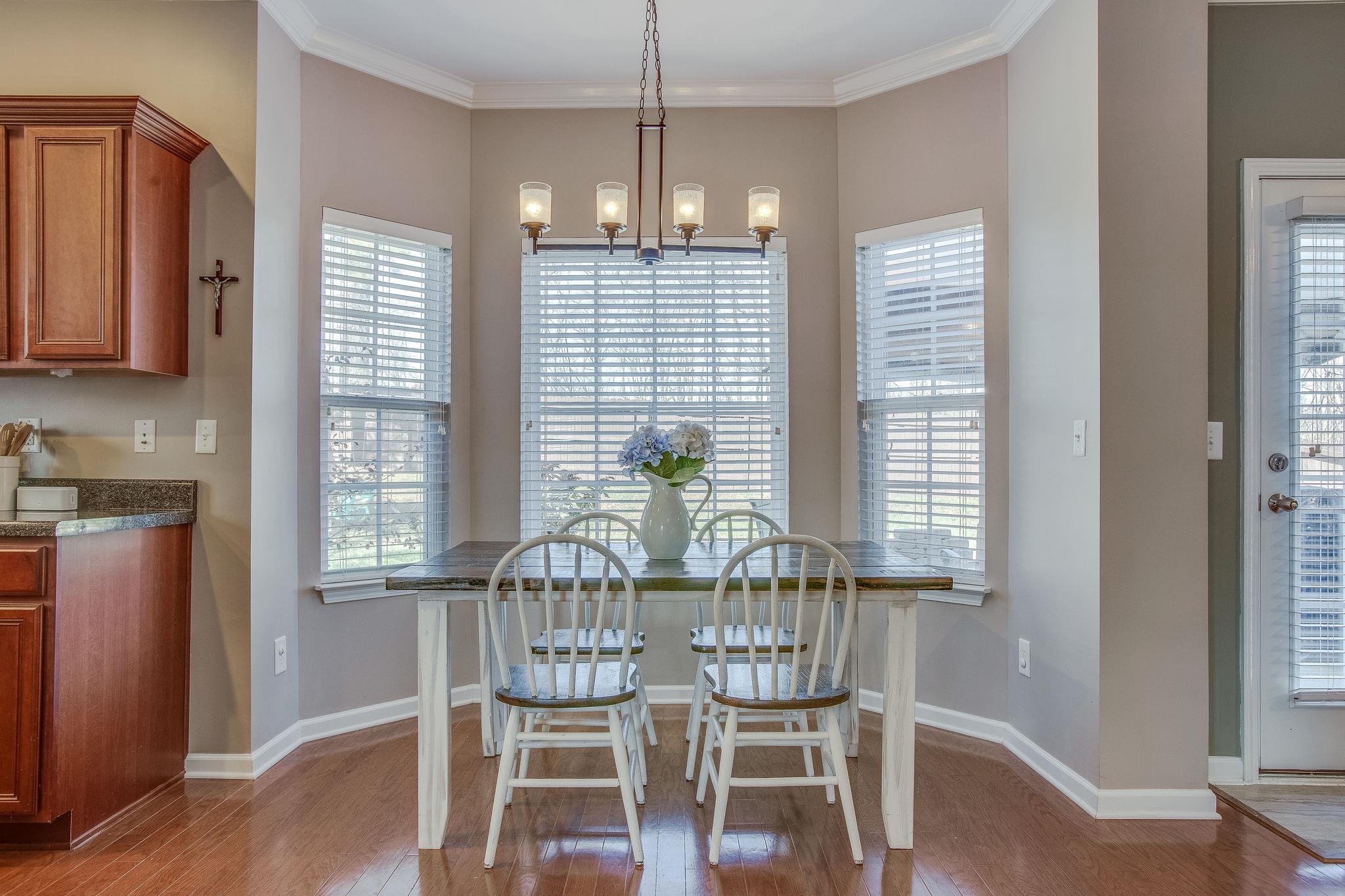 Breakfast area with view of the private back yard.