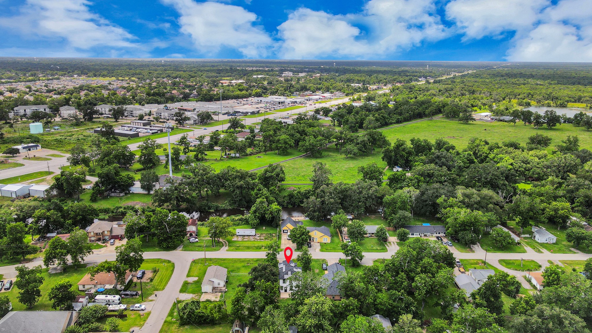 1105 East Kyle Road Clute, TX 77531 - Photo 40 of 44 The Riley subdivision is a lush, green neighborhood with spacious lots and mature trees. The area is peaceful with a mix of homes and open spaces.