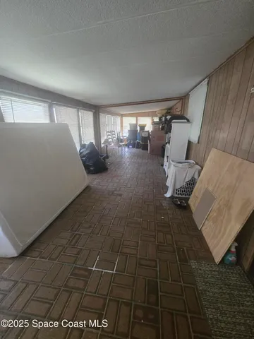 a view of a house with backyard and garden